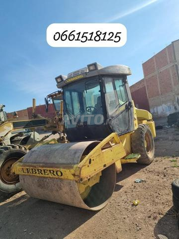 Niveleuse Caterpillar 12G et compacteur - 2