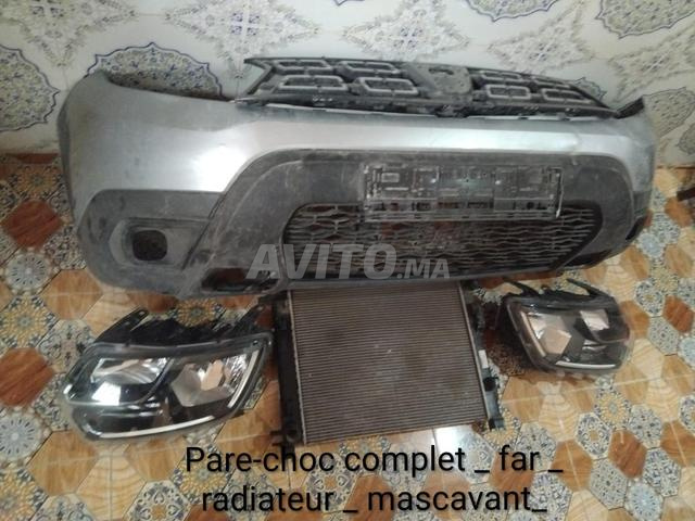 Pare-chocs complet, radiateur et calandre avant