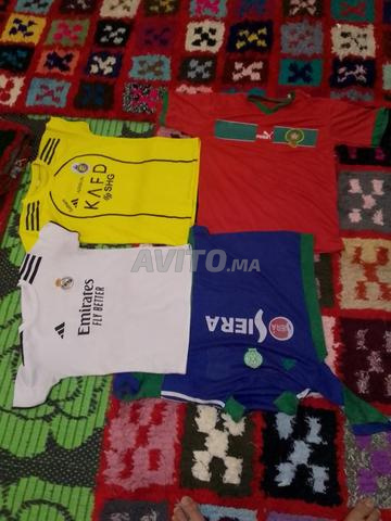 بيع ملابس أطفال ما بين 12 و20