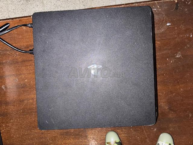 PS4 slim avec jeux et deux manettes - 2