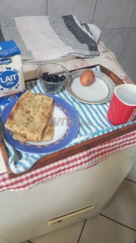 femme africaine nounou ménage cuisine repassage