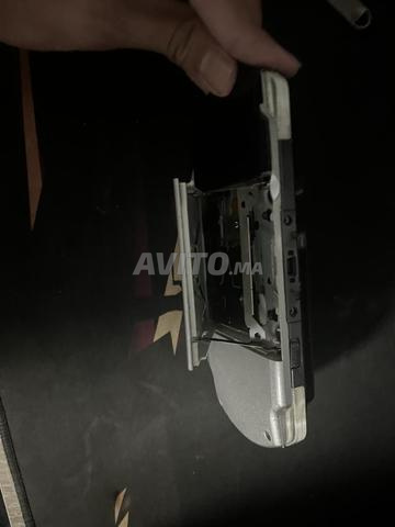 PSP 2000 مع شاحن و 32 جيجا تخزين - 2