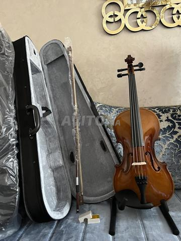 violons 4/4 amati avec un equaliseur