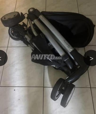 Poussette presque neuve avec sa housse Quinny Zapp