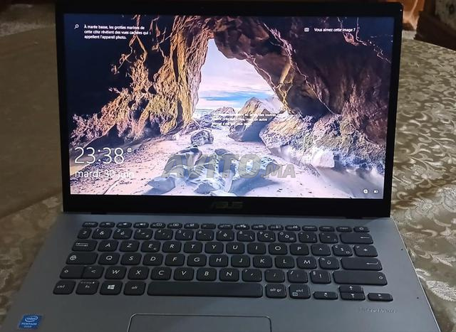 حاسوب ASUS لا يزال جديداً - 2