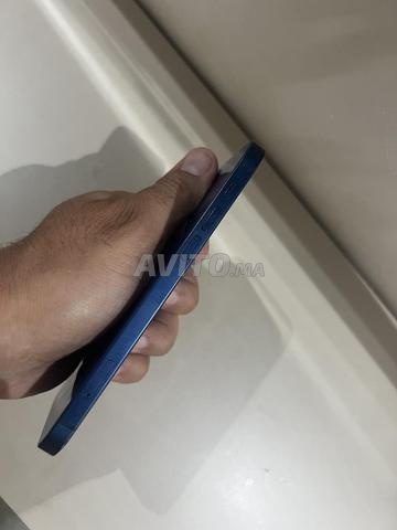 آيفون 12 عادي 64 جيجا حالة البطارية 76