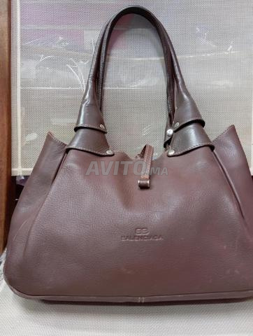 Sac femme original de grande marque en bon état