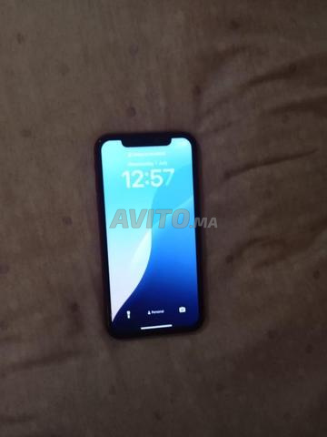 iPhone XR neuf 1400 dh état 77 et 64go - 2