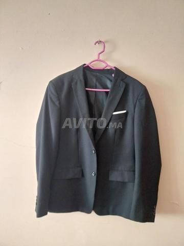 Vêtements en bon état - 2