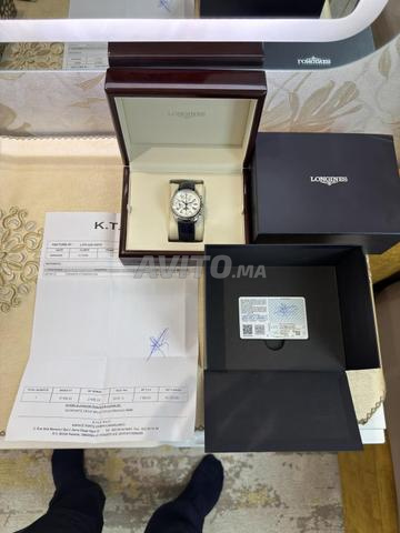 Longines triple calendrier facture et carte