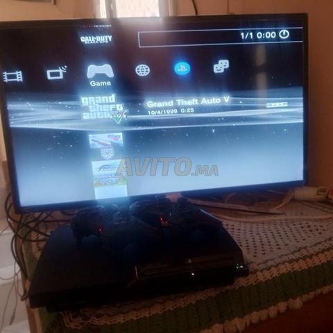 PS3 avec 2 manettes et 1 jeu - 2