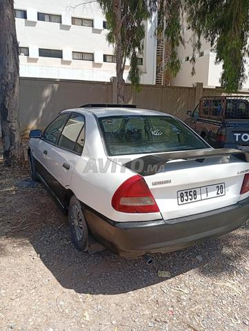 ميتسوبيشي لانسر بنزين نقية 96 ضريبة 650 درهم