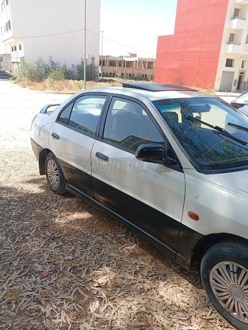 Mitsubishi Lancer essence propre 96, taxe 650dh - 2