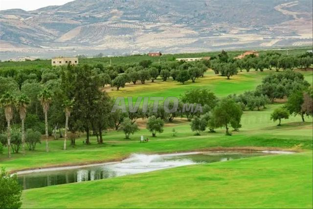 Terrain de villa situé au golf royal, route Imouzar