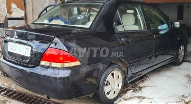 Mitsubishi Lancer Essence 2008 - 2