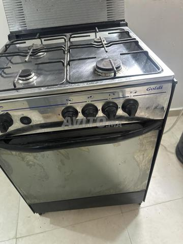 Cuisinière Goldi 4 feux avec four comme neuf