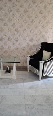 Deux fauteuils avec table basse - 2