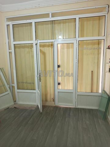 Porte en aluminium Hauteur 2,80 Largeur 2,97