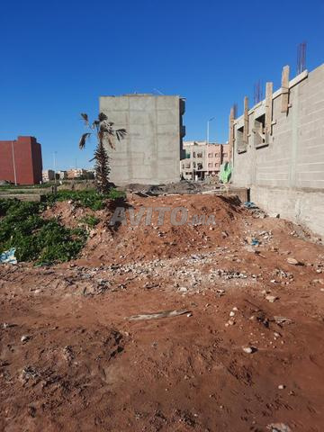 Terrain résidentiel titré et loti, lotissement Al Firdous, 91 m² - 2