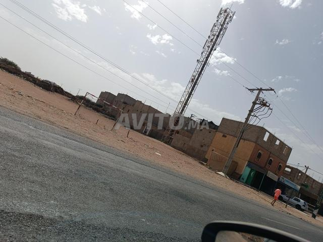 أرض بمساحة 4996 متر مربع مرخصة في بيوݣرة