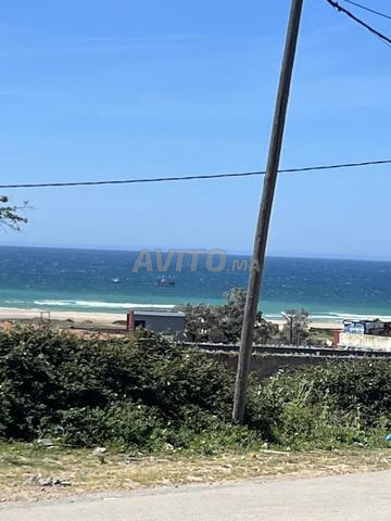 Terrain 837 m2 avec petite maison vue sur mer m2