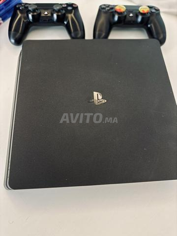 PS4 slim 1To avec 2 manettes et des jeux (photos) - 2