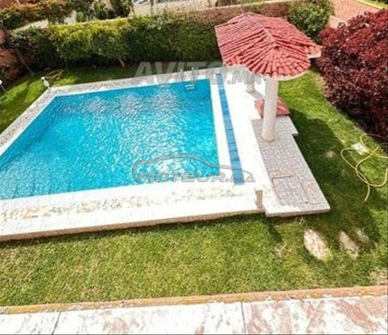 فيلا بمساحة 600 متر مربع مع مسبح
