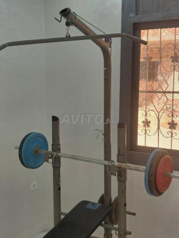 مقعد تمارين رياضية ديكاثلون 60 كيلو مع بار