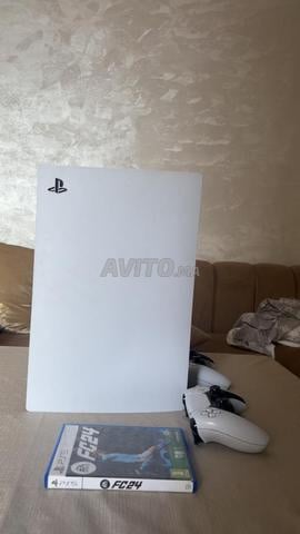 Une PS5 en bon état - 2