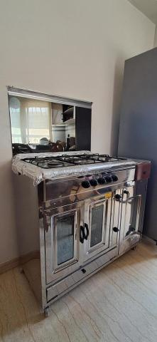 Cuisinière Tivoli Extra Four inox – Très bon état