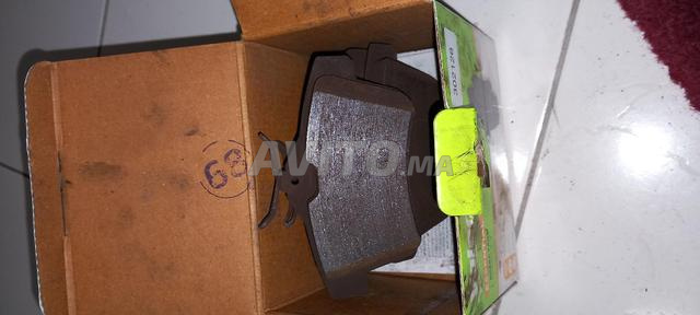 مجموعة وسادات فرامل أمامية وخلفية - 2