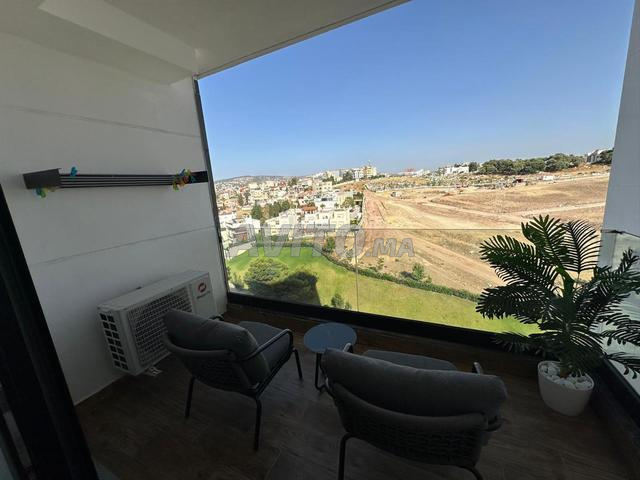 Bel appartement meublé avec terrasse et garage.