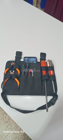 Porte-outils à la taille