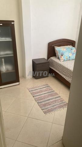 بجانب الجامعة الملكية للمصارعة