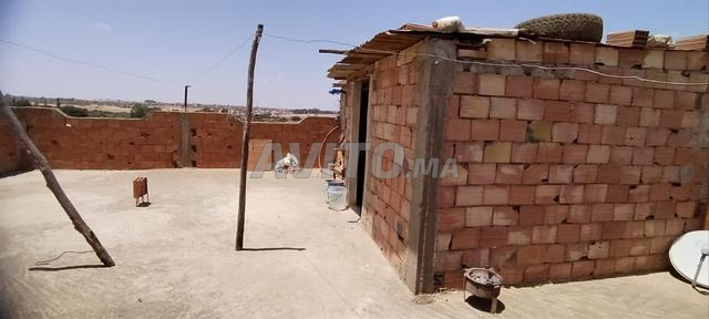 أرض 250م بها منزل مكون من طابقين وبئر بايت حدو - 2