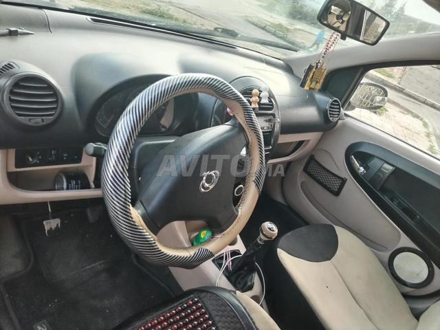 Geely Tanger plaque Houama