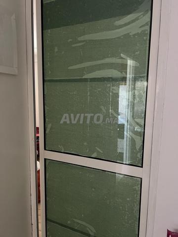 Porte aluminium à vendre en bon état – 210 × 75 cm
