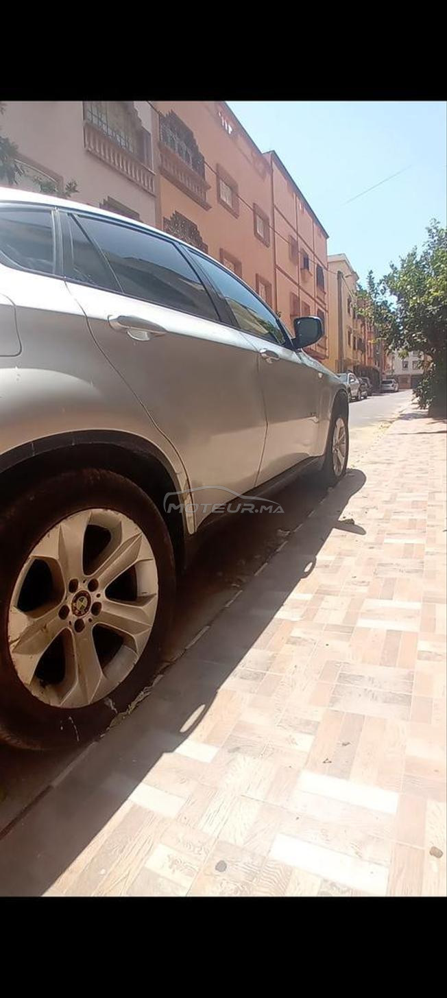 BMW X6 Essence. Details.en bas
