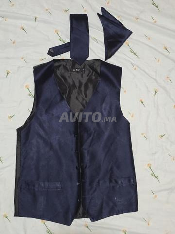 Gilet, cravate, mouchoir et boutons de manchettes