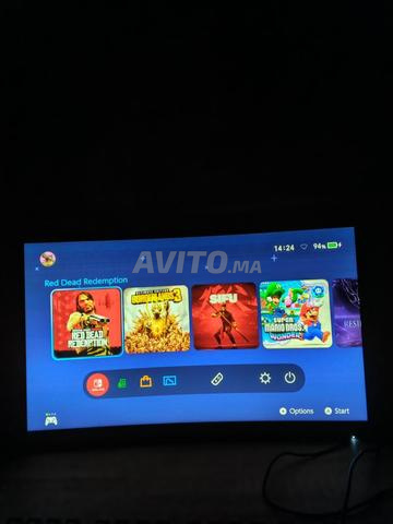 Nintendo Switch v2 flashé 500gb carte SD état 10/10 - 2