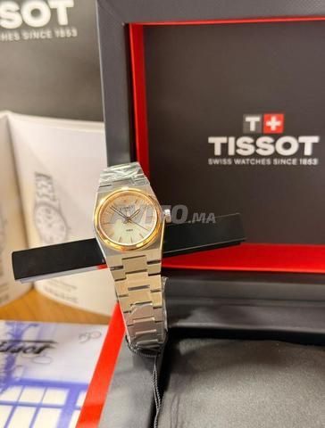 ساعة تيسوت TS13700 مع علبة - 2