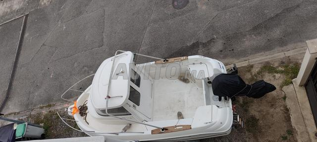 bateau Quicksilver moteur 4 temps injection