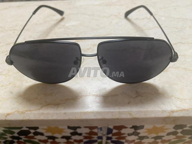 نظارات شمسية سوداء جديدة - 2