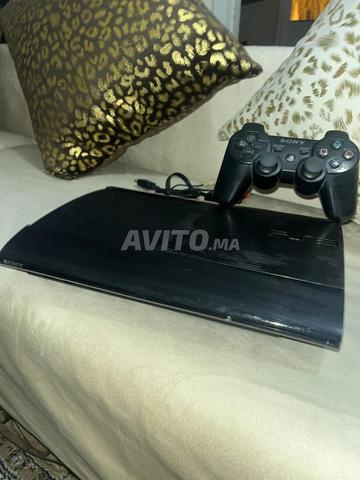 PS3 Super Slim et 1 manette avec chargeur et 4 CD - 2