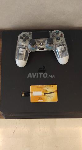 PS4 Slim flashée et 20 jeux dont 6 Originaux