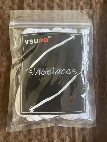 أربطة أحذية VUDO بيضاء