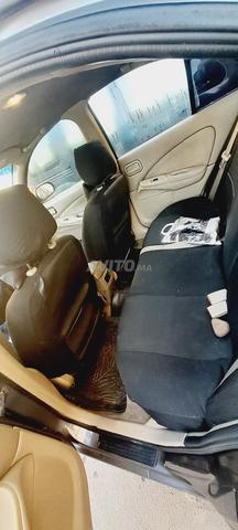 Voiture Nissan Sunny Modèle 2006 - 2