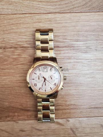 Montre Guess originale Authentique en bon état - 2