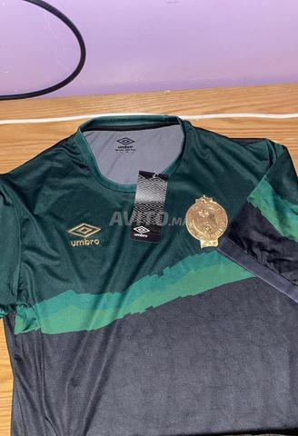 قميص الرجاء الرياضي (Raja CA) ماركة Umbro جديد مقاس L