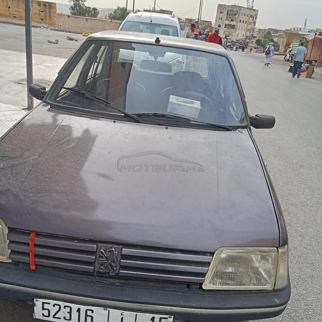 بيع سيارة من نوع بيجو 205 ديزل موديل 1998